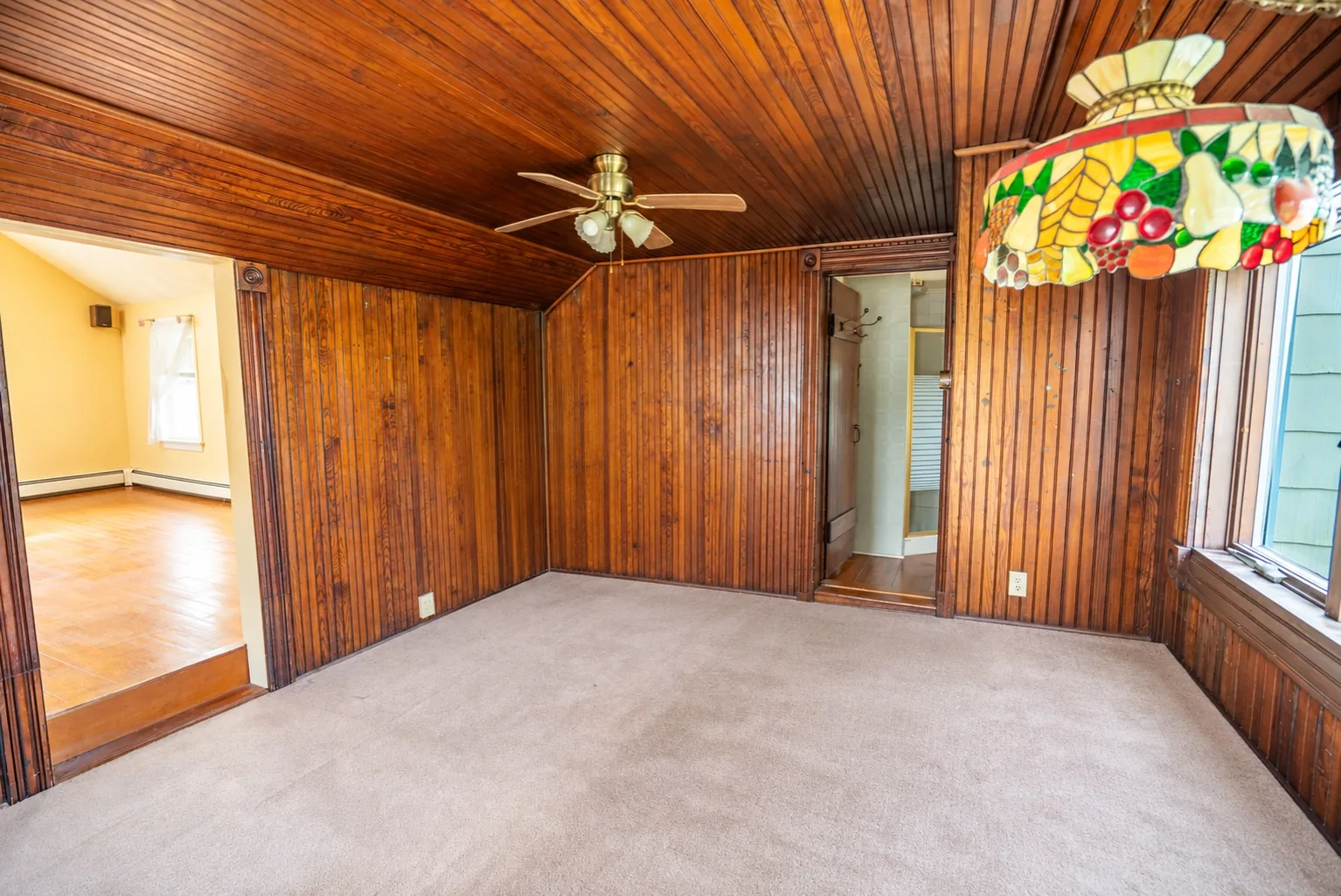 Original wood-paneled room