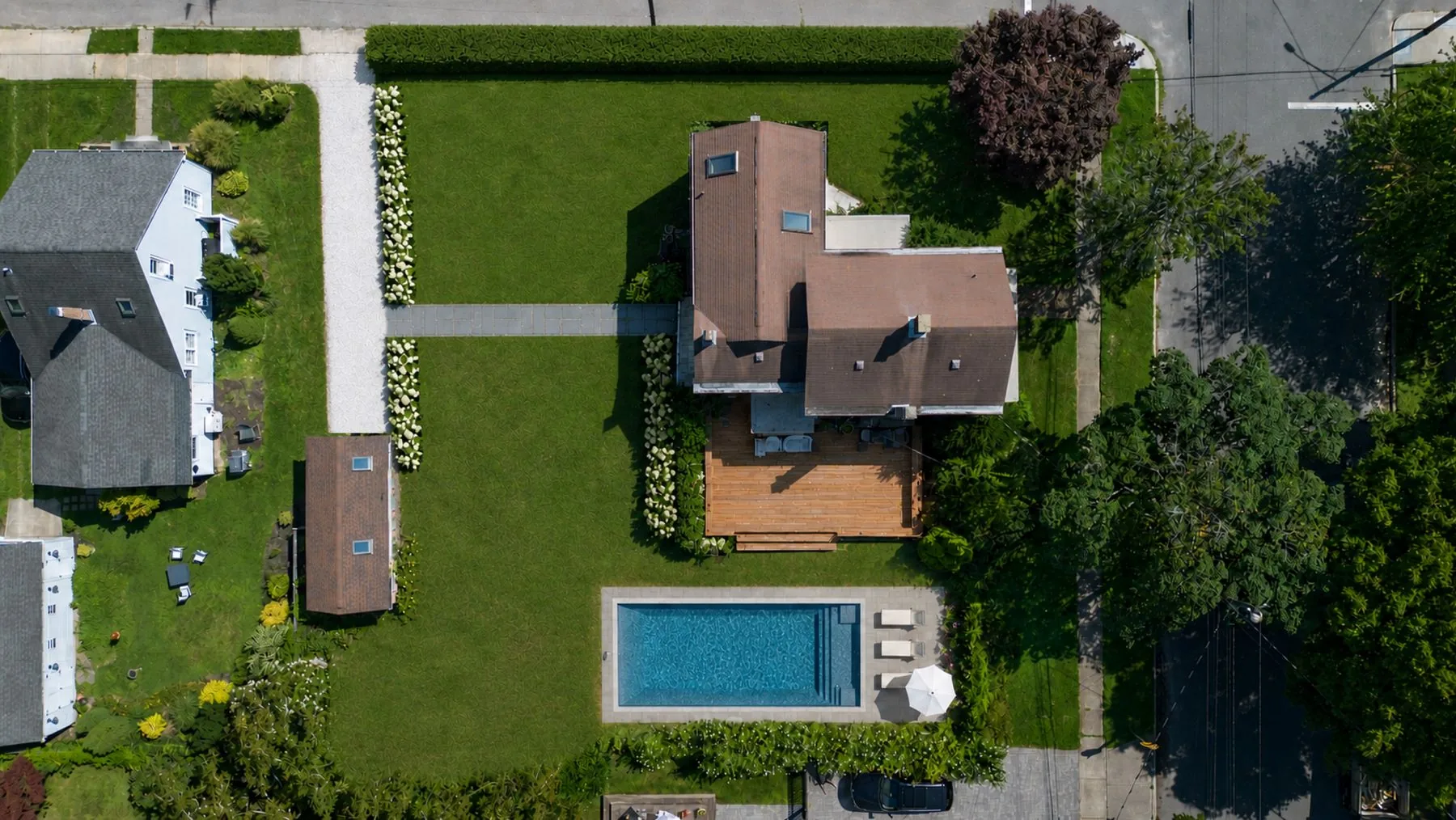Rendering of the grounds landscaped, with a pool