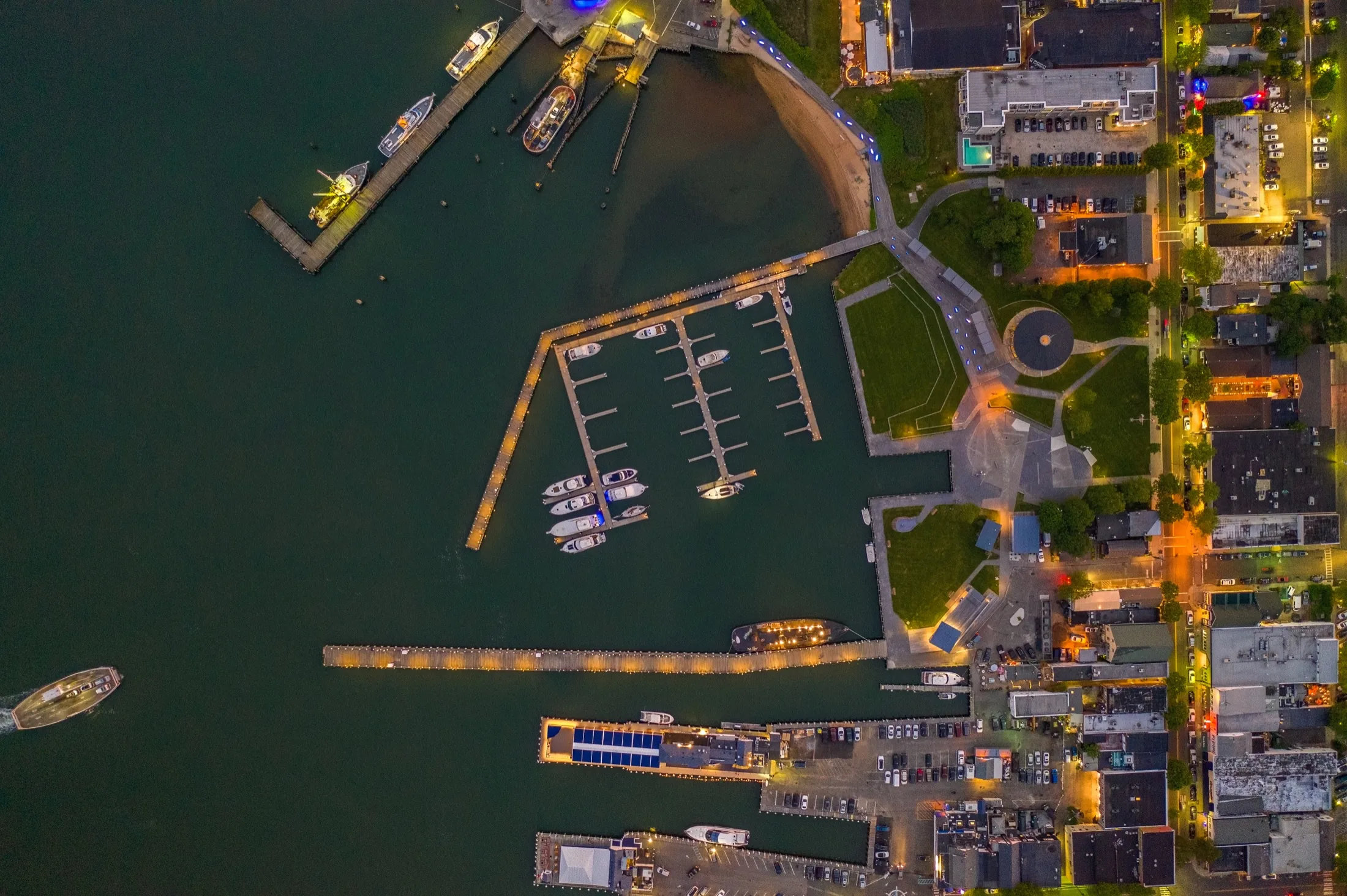 Mitchell Park, the carousel and Greenport Harbor illuminated at night, photographed by Alexander Aquino