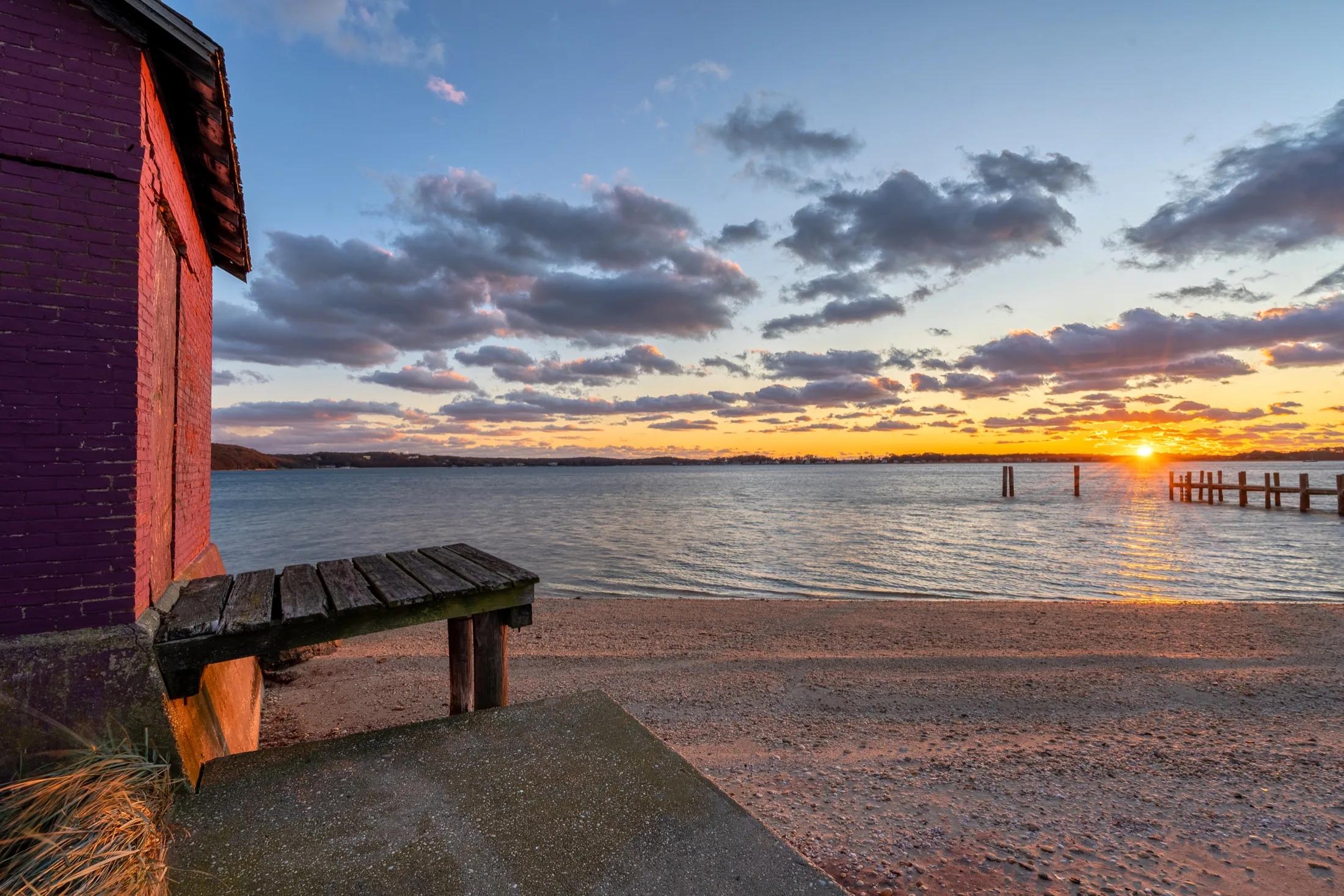 A winter sunset over the bay in Greenport, photographed by Alexander Aquino